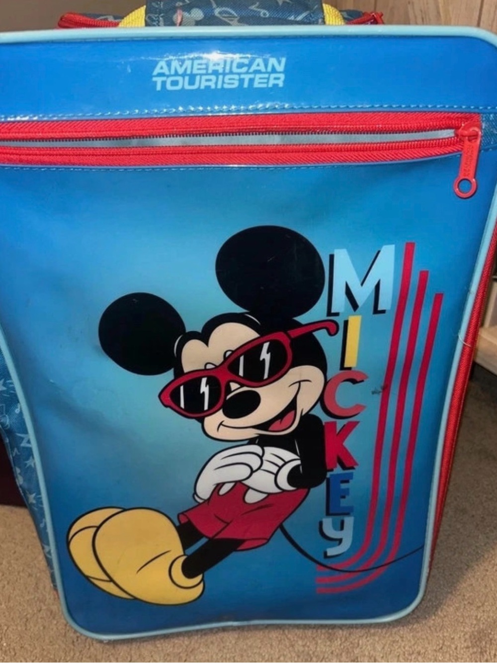 American Tourister Blue Mickey Mouse Travel Bag with Red Accents